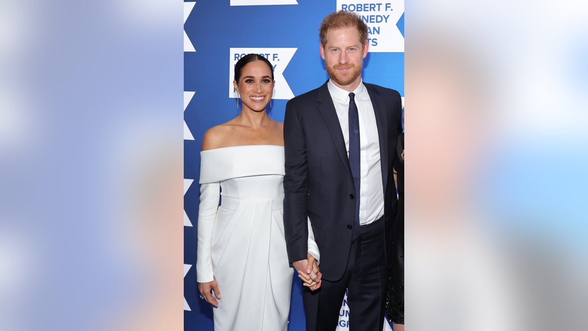 Prince Harry and Meghan Markle at an awards ceremony