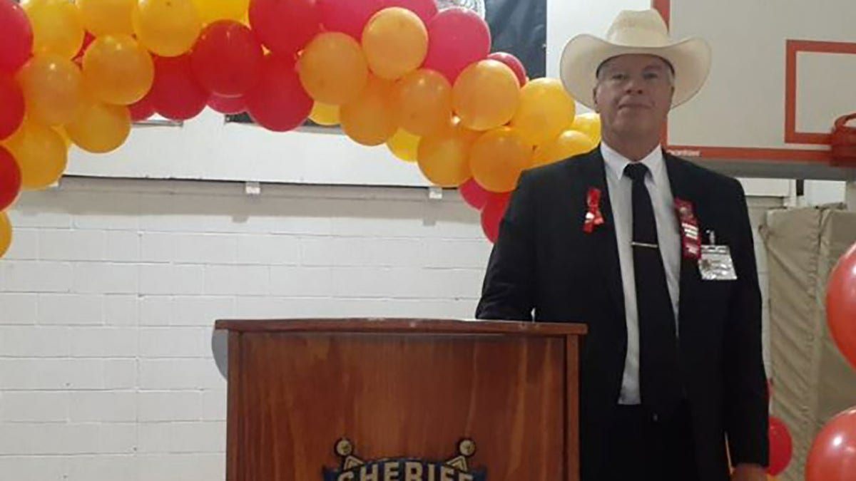 Sheriff David Hathaway standing behind a podium