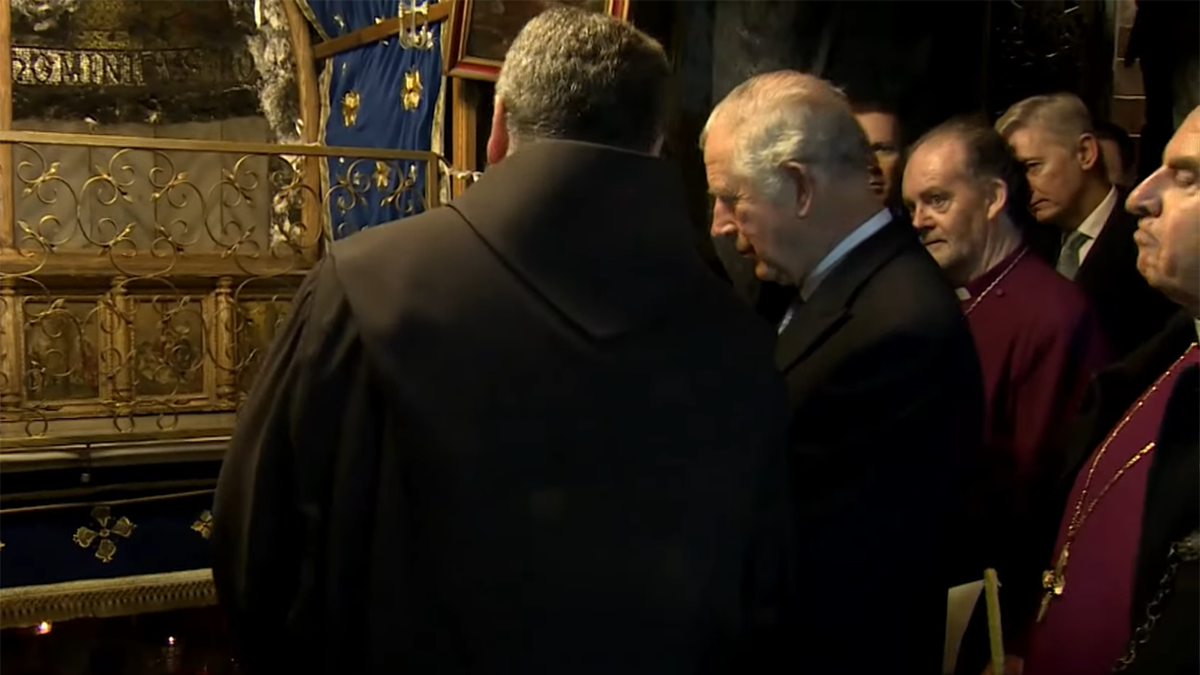 King Charles in Bethlehem with religious leaders looking on