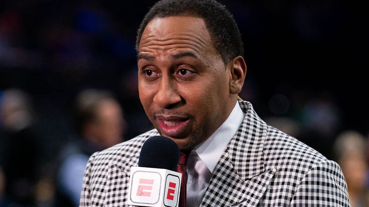 Stephen A.Smith with microphone