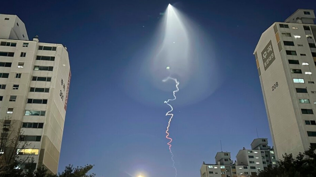 A light trail from a solid-fueled rocket over Seoul