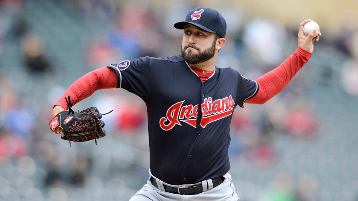 TJ House throws a pitch