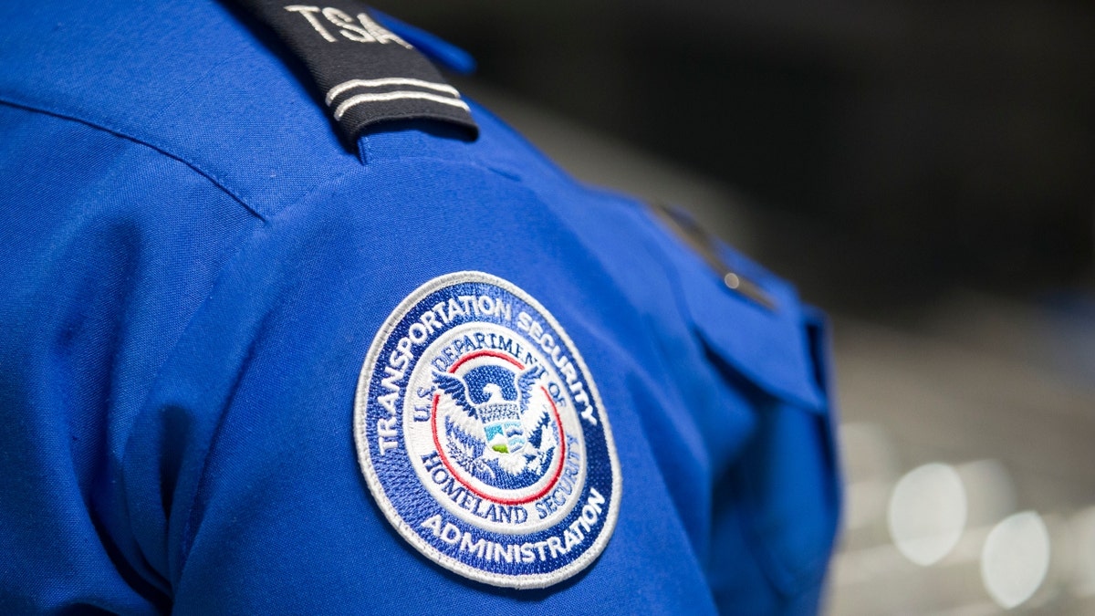 TSA logo on TSA officer shirt