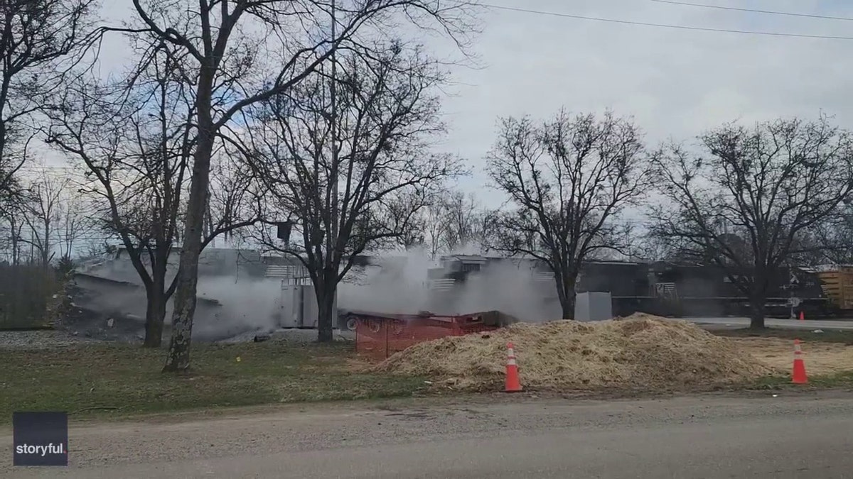 train smashing through truck on tracks