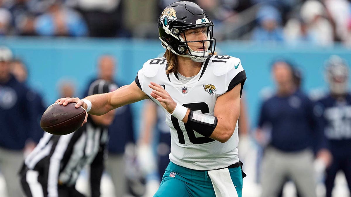 Jacksonville Jaguars quarterback Trevor Lawrence throws a pass