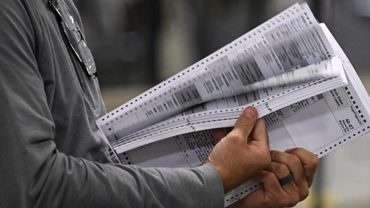 Pennsylvania poll workers process ballots