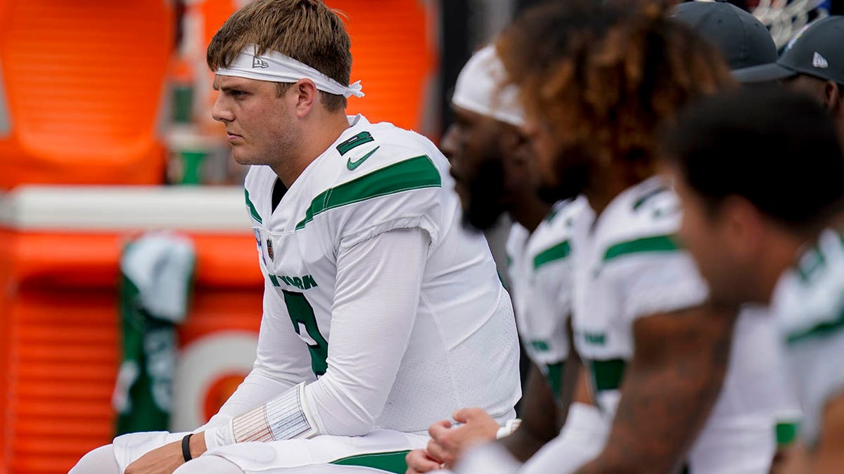 Zach Wilson sits on the bench