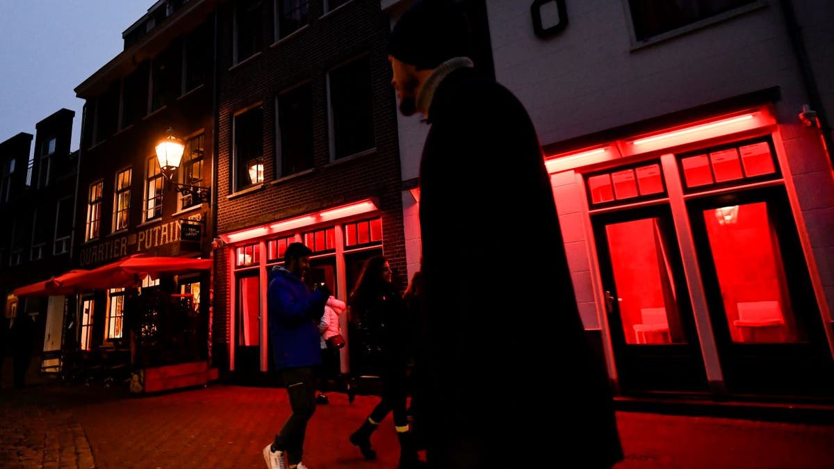 Amsterdam looks to ban red light district sex workers from windows to combat nuisance tourism Fox News photo