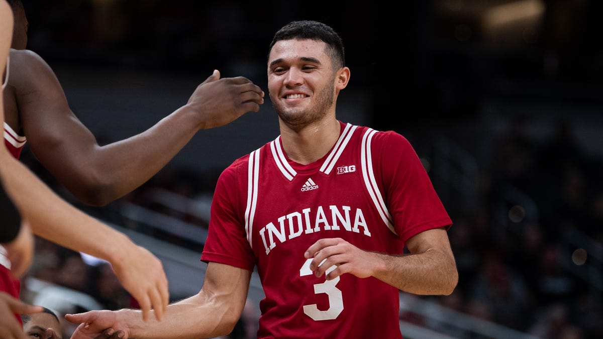 Anthony Leal high fives teammates