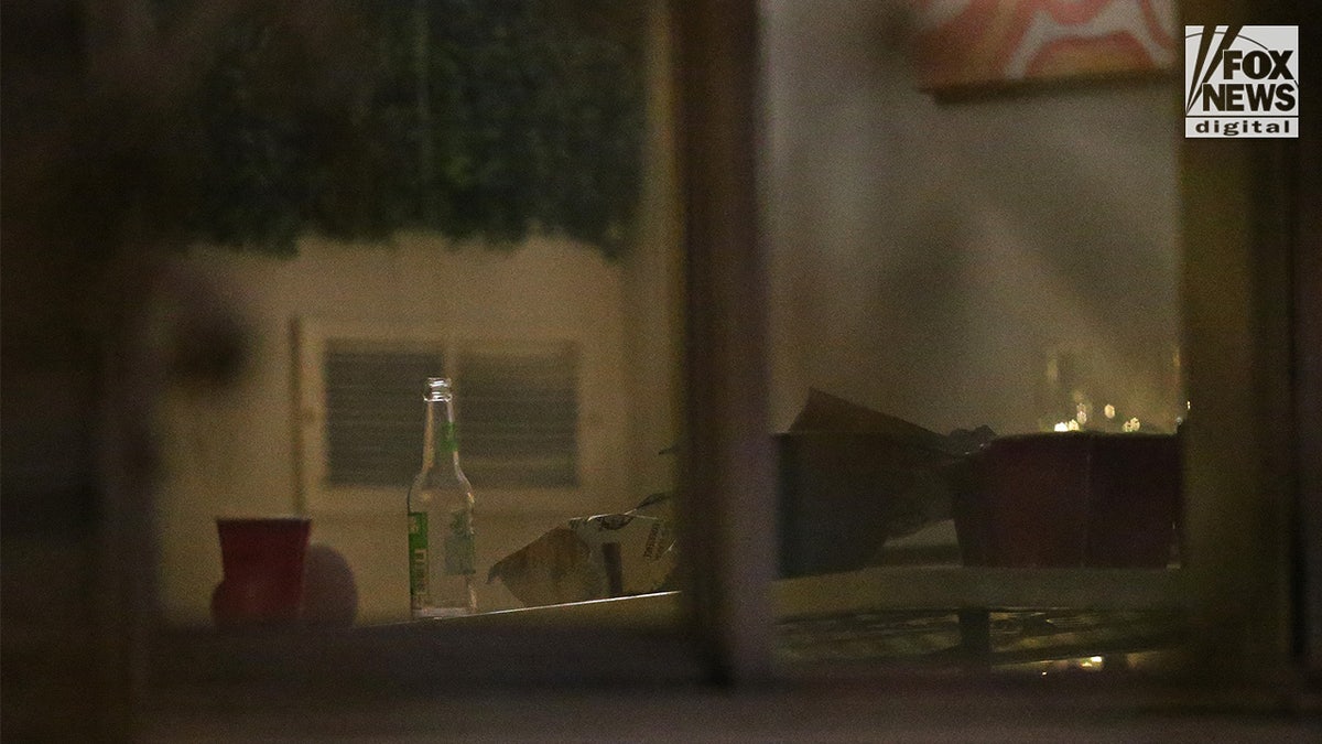 Beer bottle on ping pong table