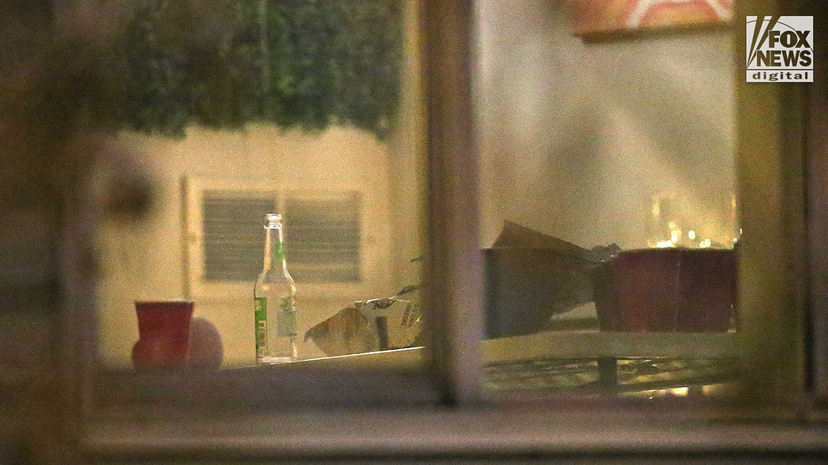 PHOTO SHOWS DRINK ON WINDOW SILL IN MOSCOW IDAHO HOME