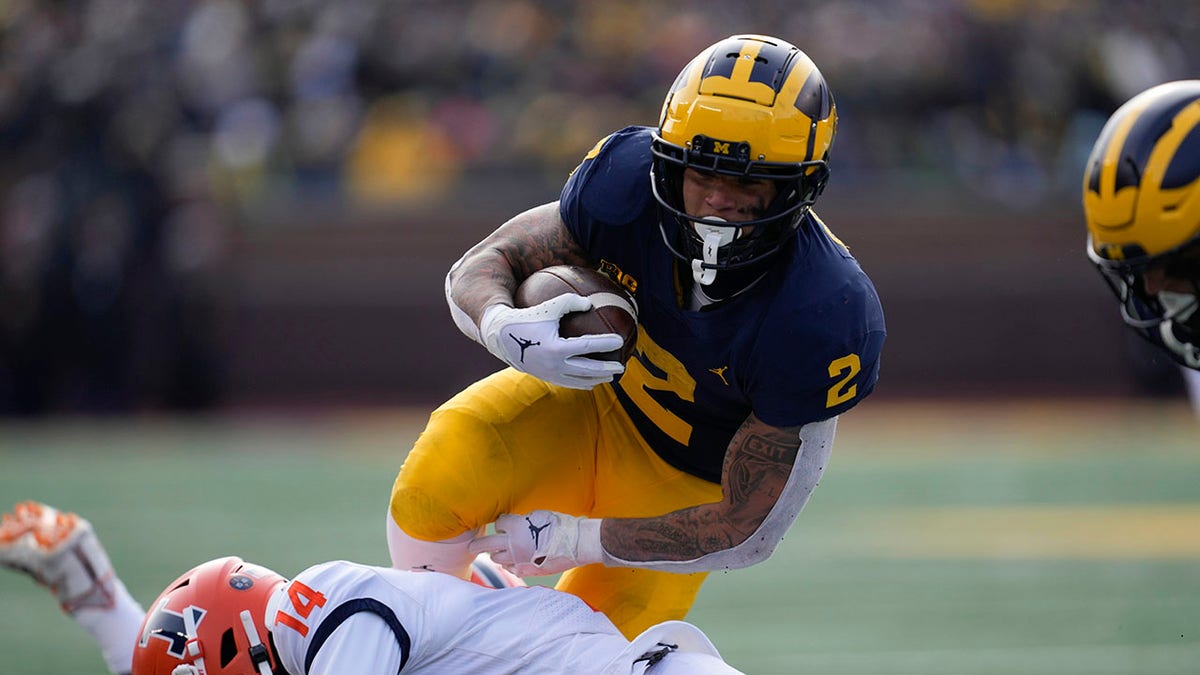 No. 2 Michigan s Heisman hopeful out for season to undergo knee