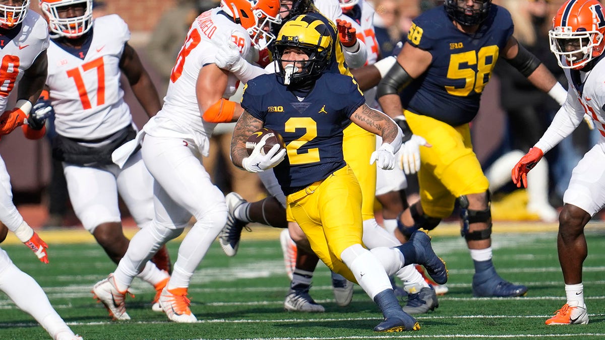 No. 2 Michigan s Heisman hopeful out for season to undergo knee