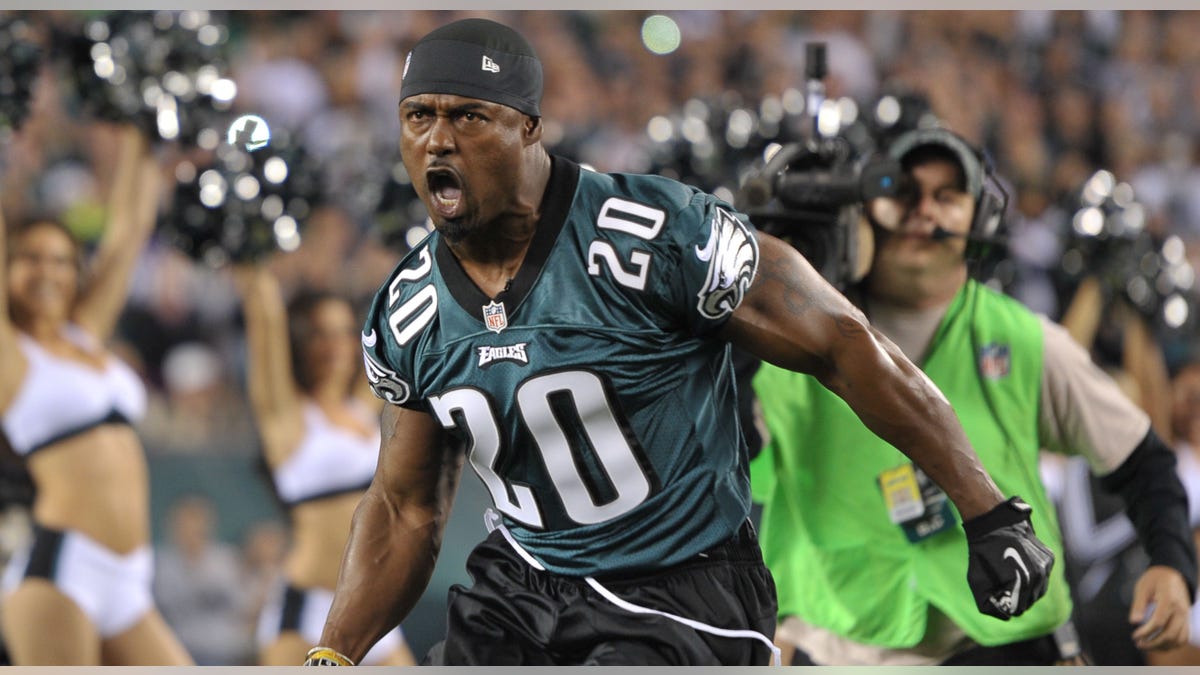 Brian Dawkins yells running