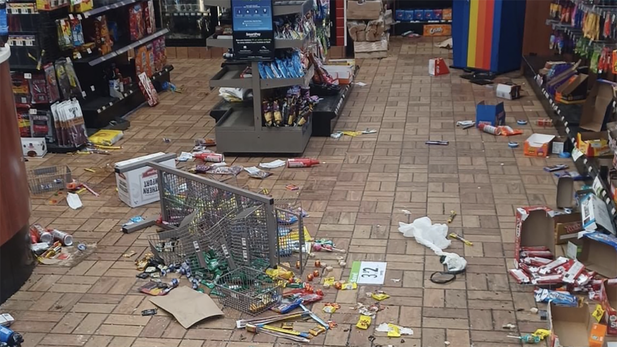 Goods strewn on grocery store floor