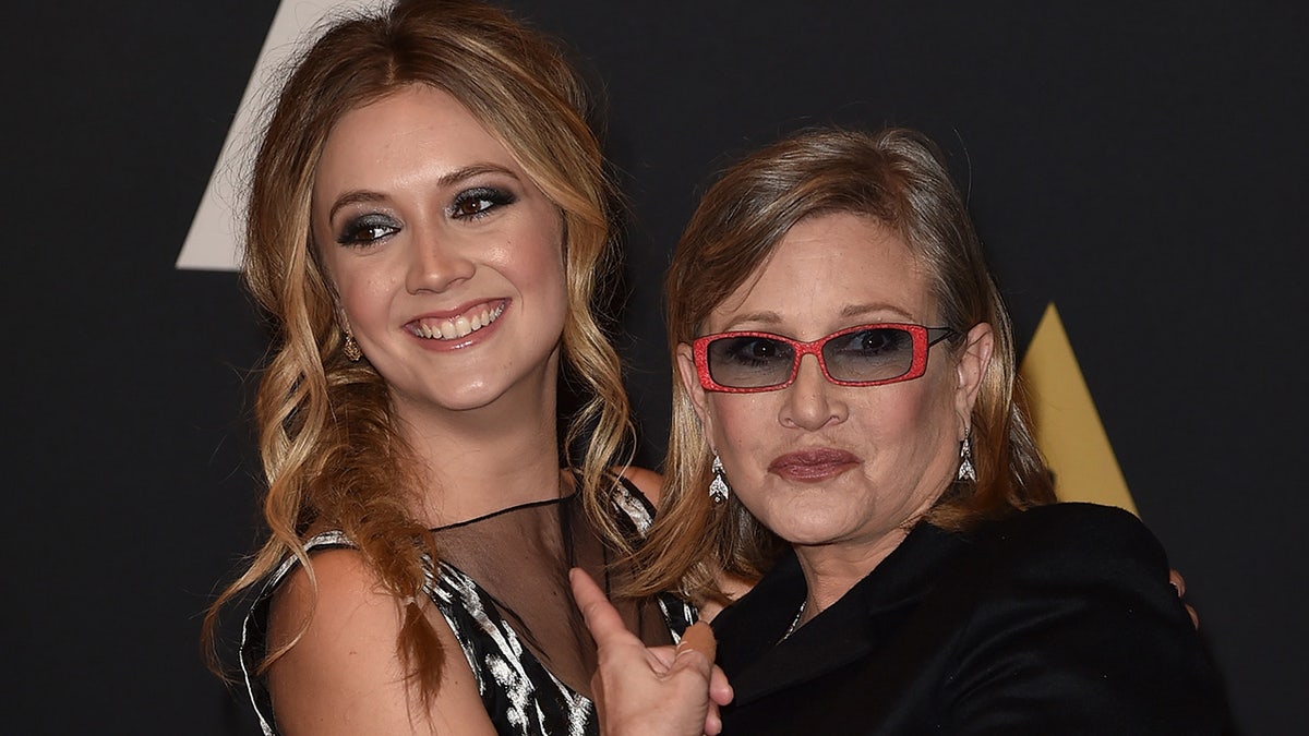 Carrie Fisher hugs daughter Billie Lourd