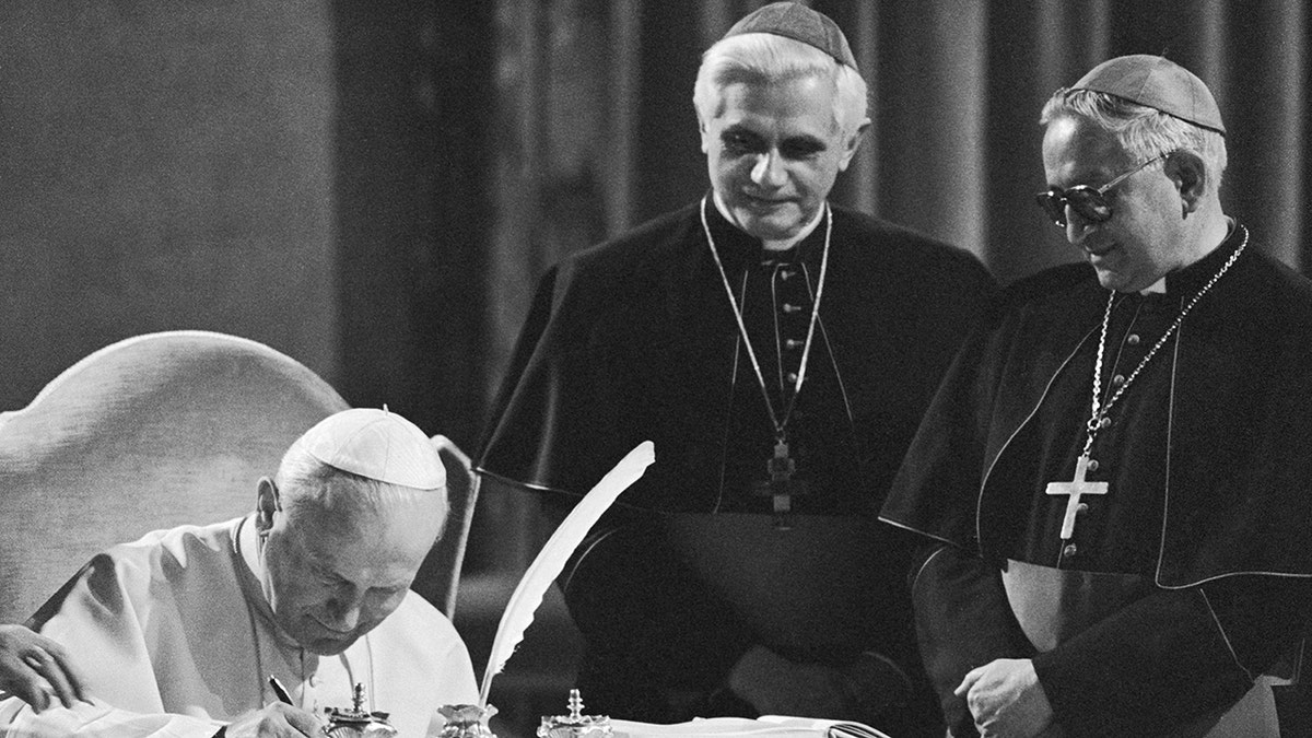 Pope John Paul II with then Cardinal Ratzinger