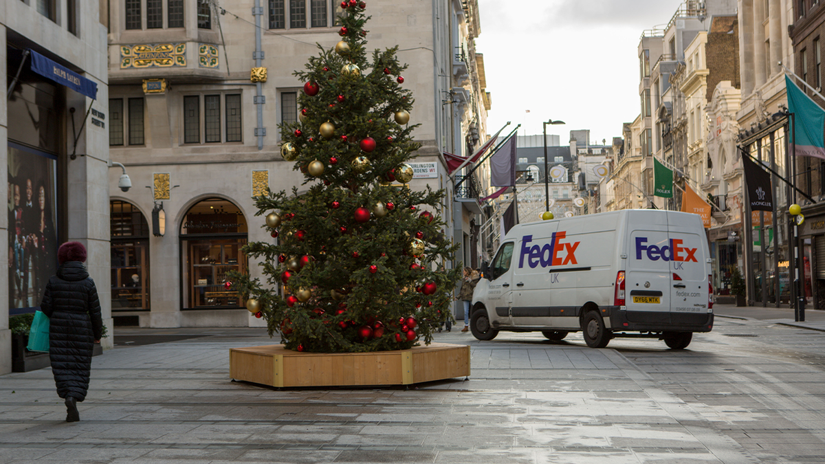 FedEx van near Christmas tree
