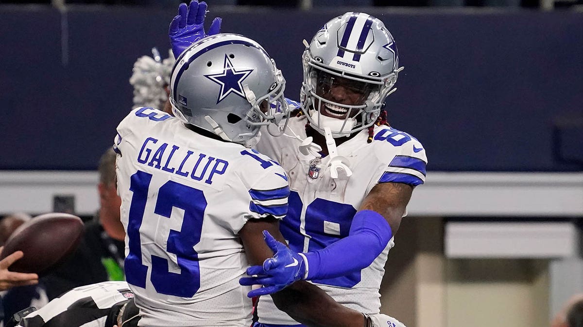 Michael Gallup and CeeDee Lamb celebrate touchdown