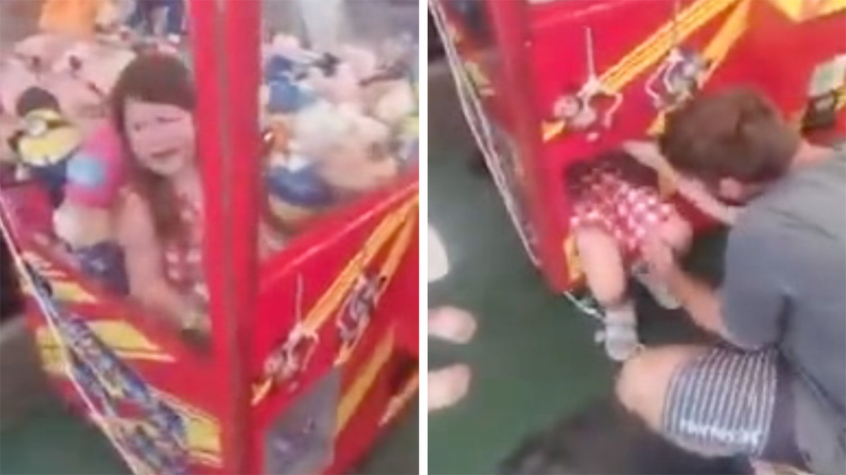 girl stuck in claw machine