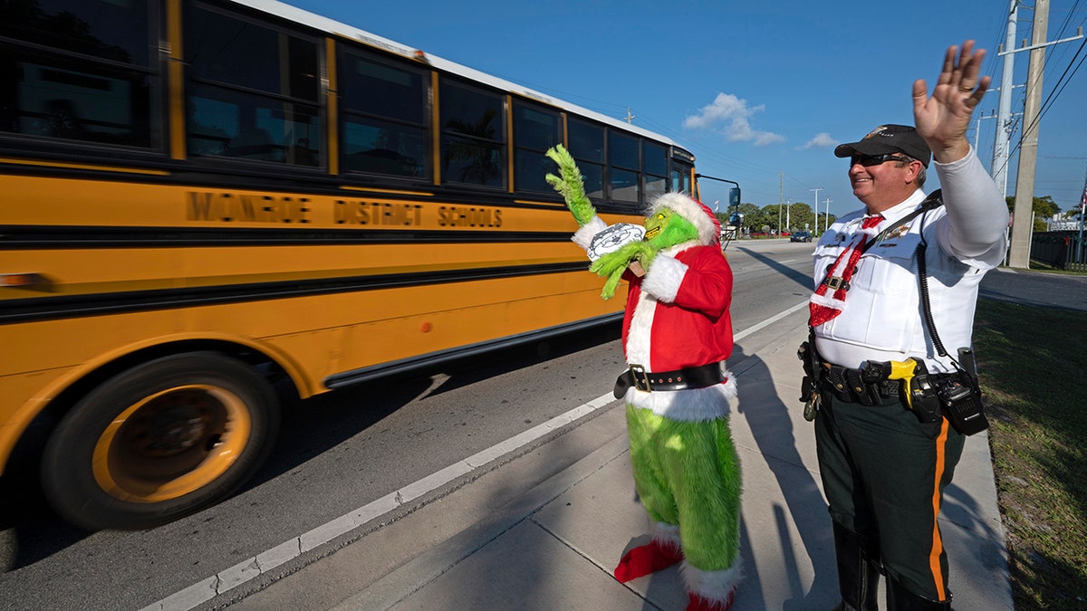 Fla. deputy as Grinch with school bus