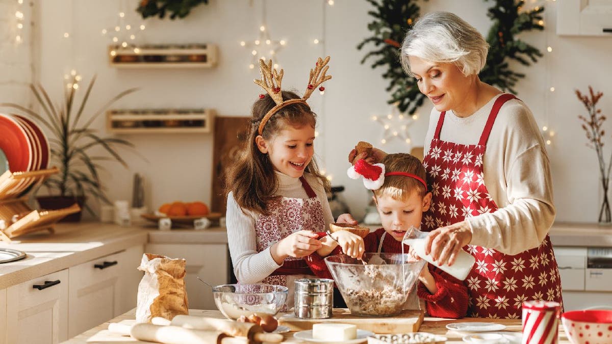 Woman bakes holiday treat with children