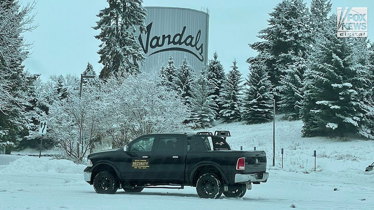 Black security truck seen on University of Idaho campus in the snow