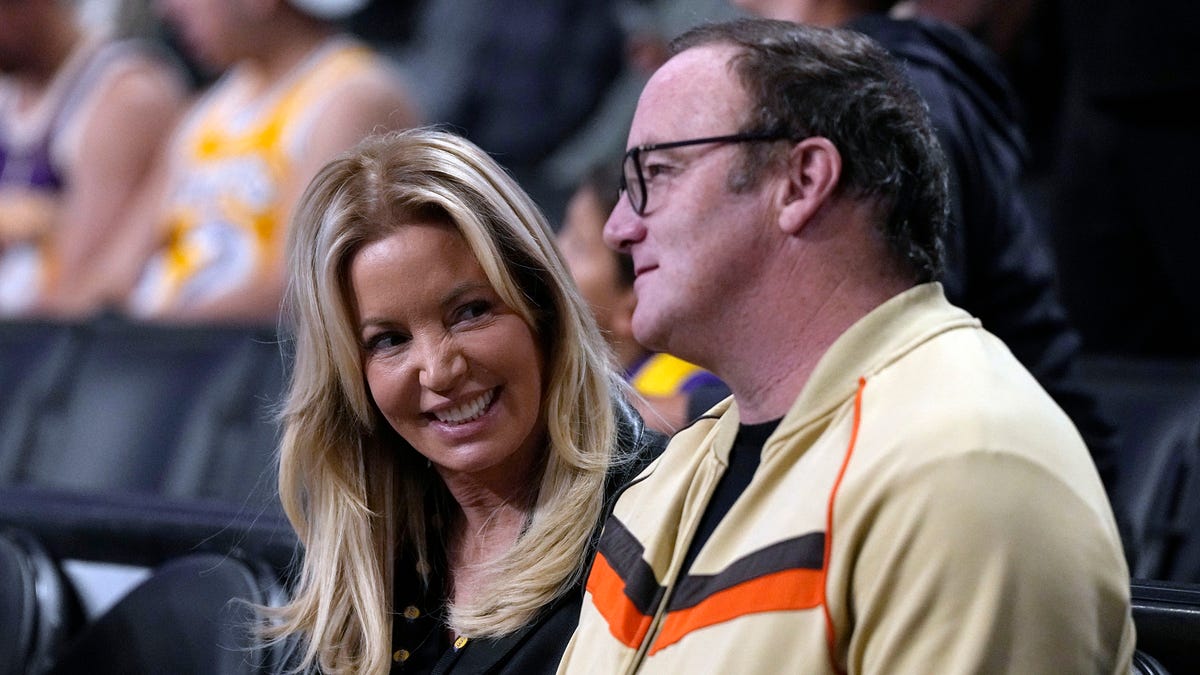 Jeanie Buss smiles at Jay Mohr
