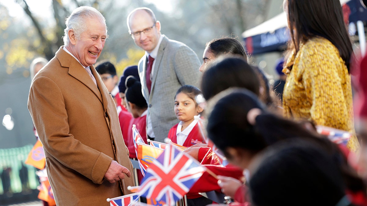 King Charles speaking to children