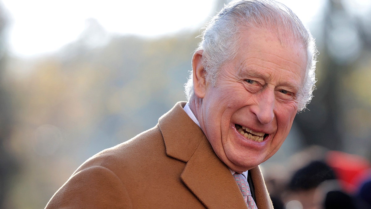 King Charles III smiling