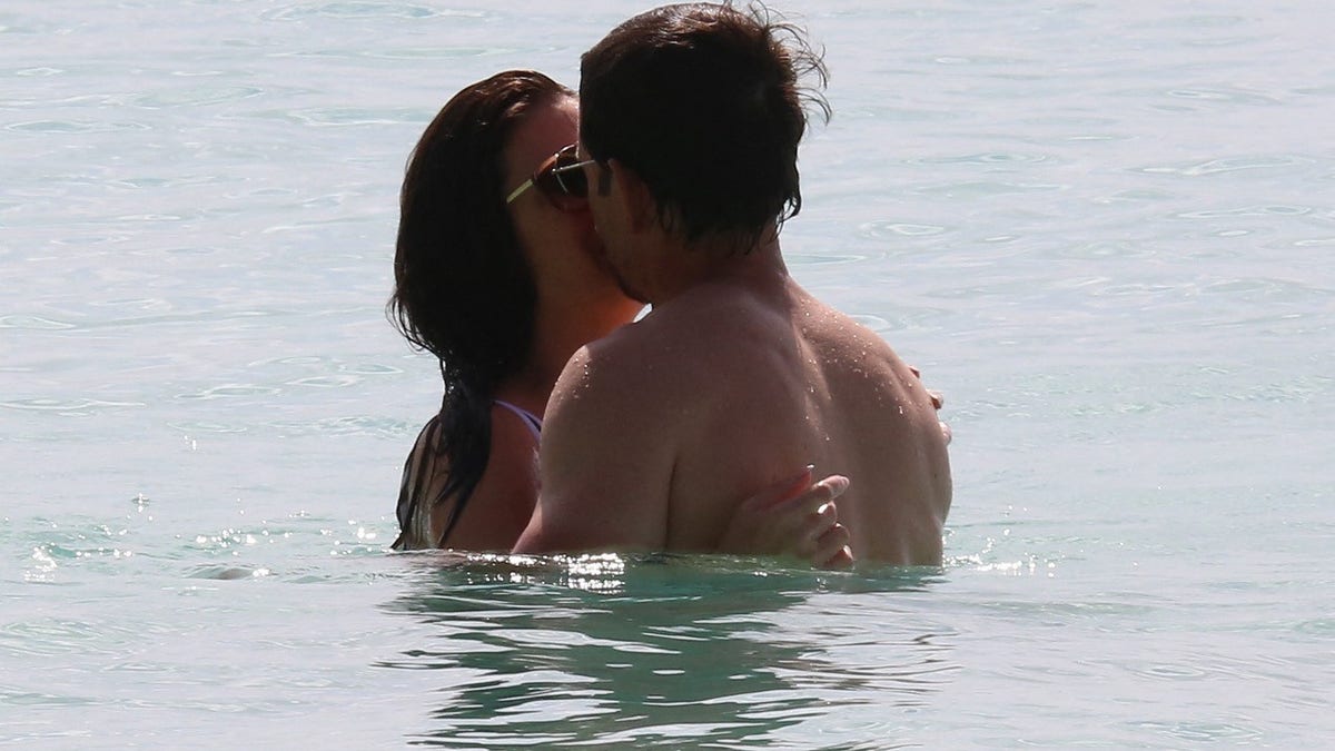 Mark Wahlberg makes out with his wife Rhea Durham in the water on vacation