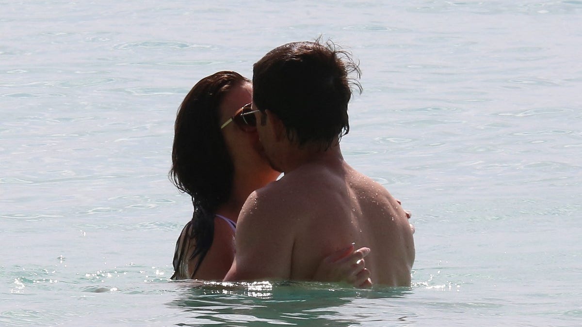 Mark Wahlberg makes out with his wife Rhea Durham in the water on vacation