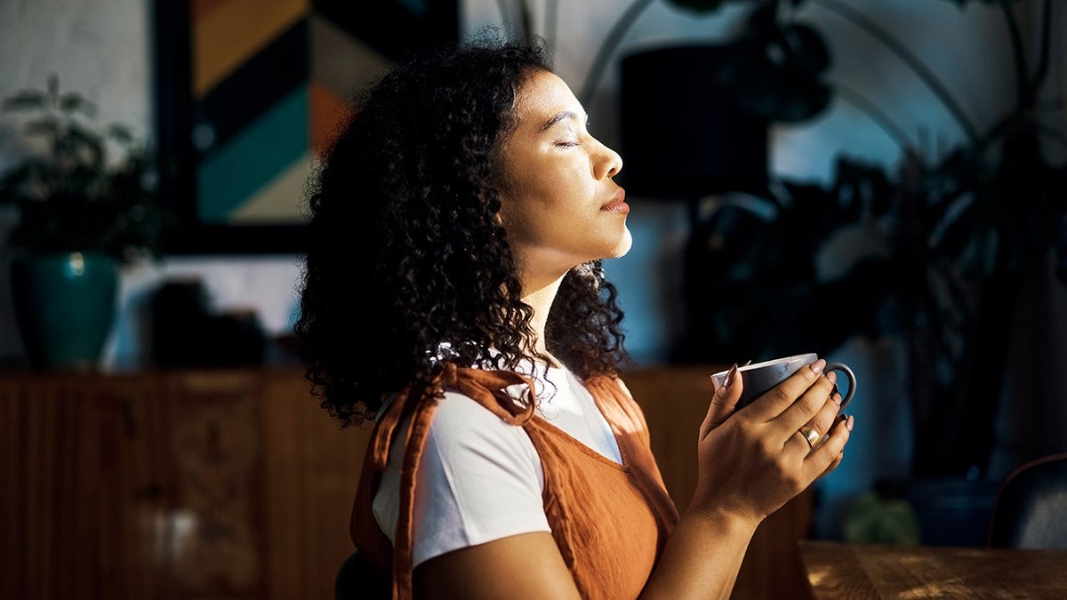 woman relaxing with coffee