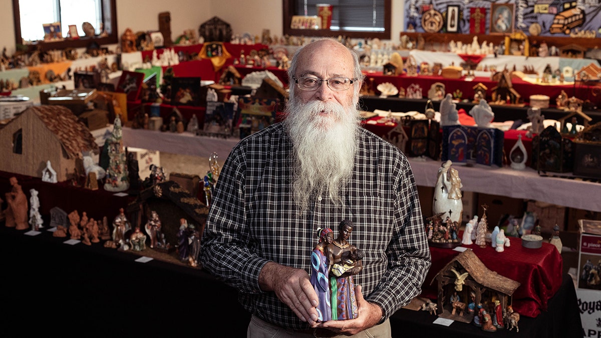 Michael Zahs with nativity display