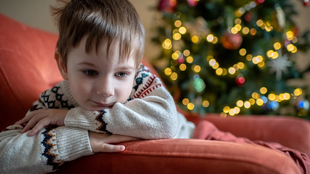 child at home at Christmas