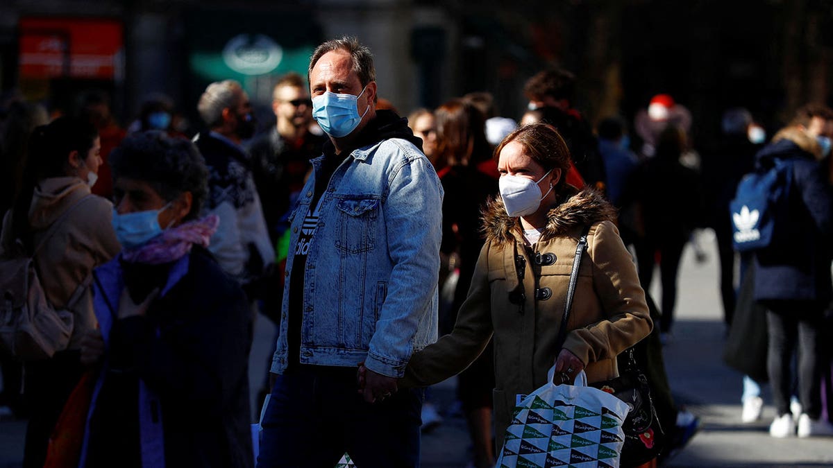 People wearing masks in Spain