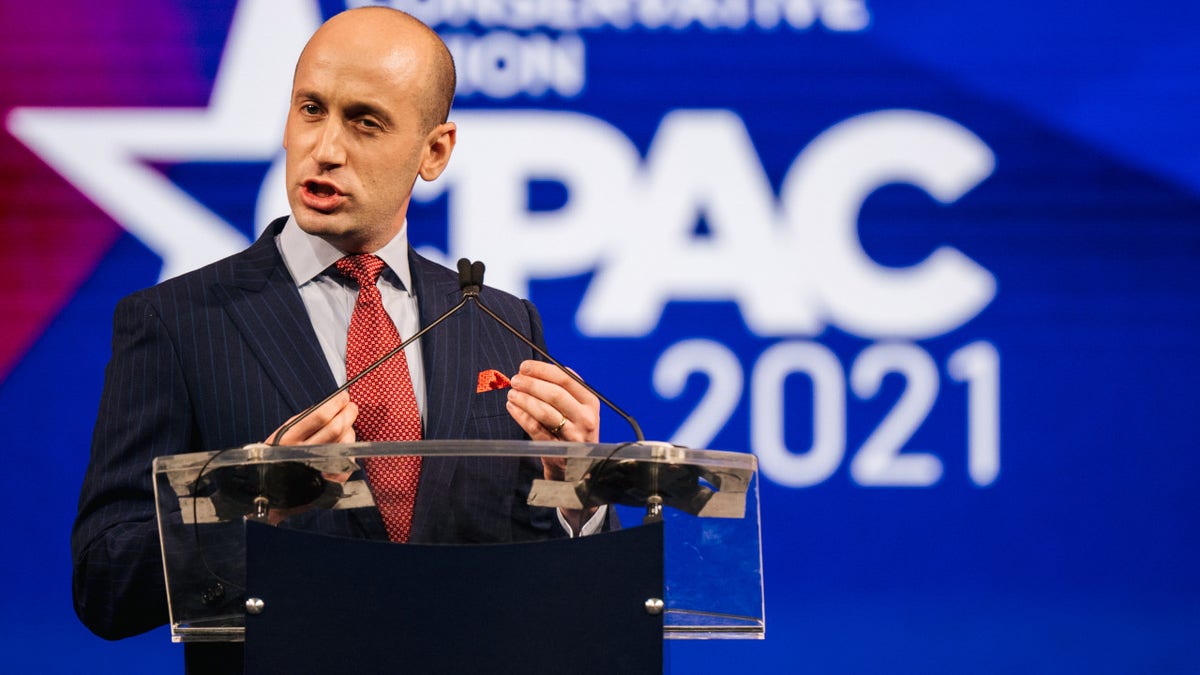 Stephen Miller speaks into a micropjone at CPAC