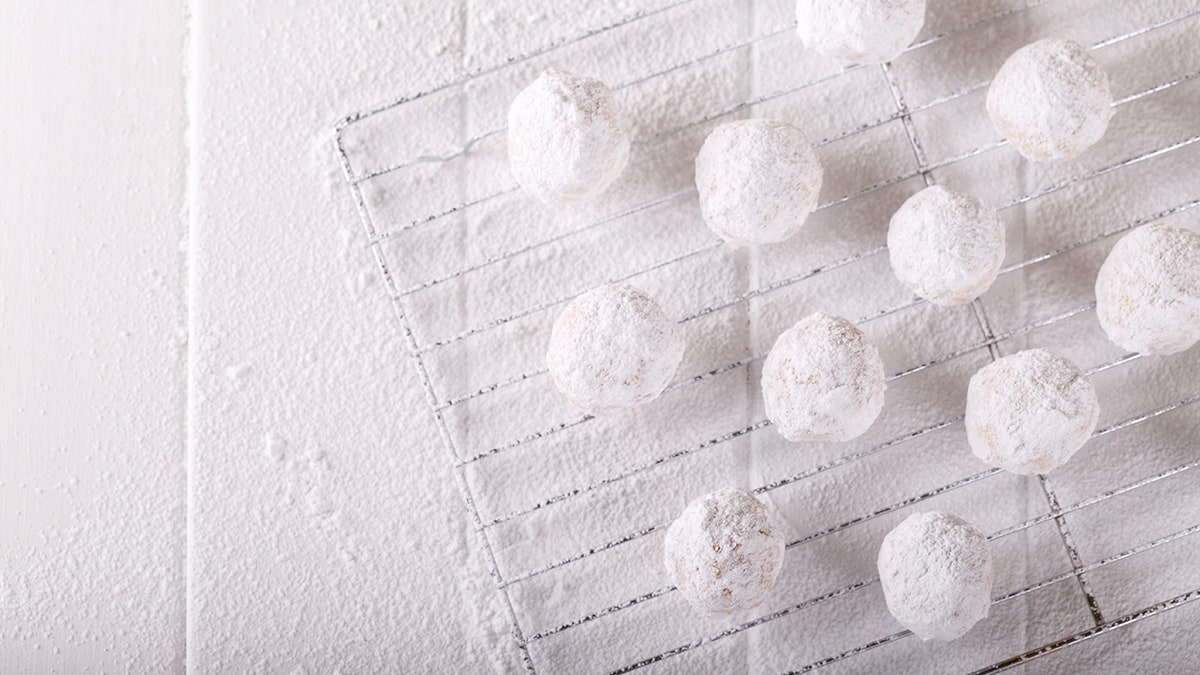 snowball cookies on white surface