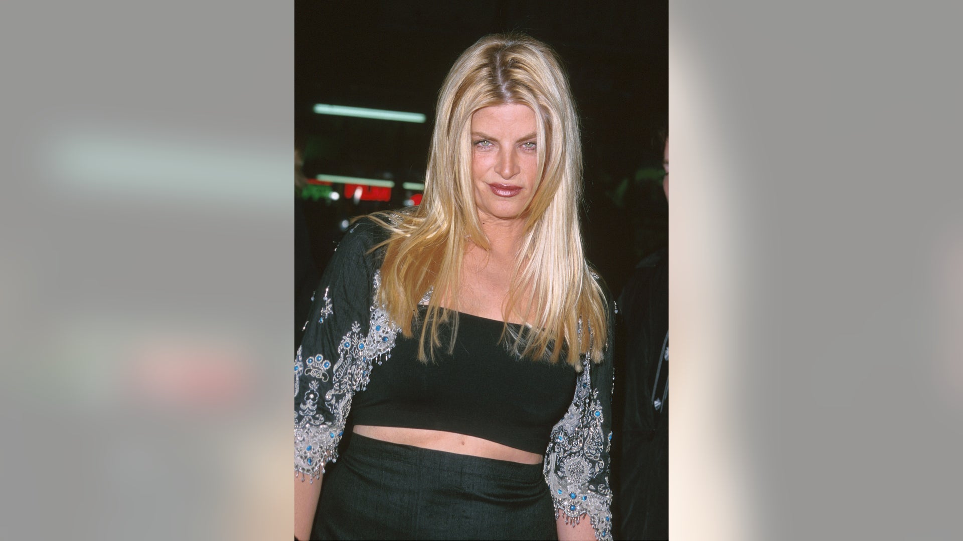 Kristie Alley poses for a photo