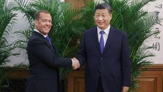 Russia's Medvedev, China's Xi discuss 'strategic partnership' in surprise visit