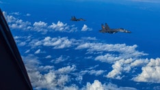 Taiwan's defense ministry says dozens of Chinese military aircraft entered air space near island