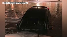 Viral video shows Indianapolis woman driving car on frozen canal before going through the ice