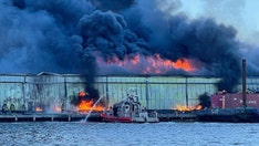 New York City firefighters injured battling massive blaze at NYPD evidence station