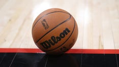 Delivery man who walked on court during college basketball game appears to be prankster