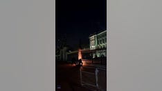 WATCH: Man sets fire at Buckingham Palace gates, police tackle him to ground as blaze continues