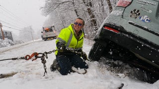 Thousands without power in freezing temperatures after storm blasts region