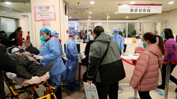 COVID in Beijing 'peaks' as hospitals, funeral homes fill up