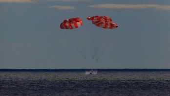 NASA's Orion spacecraft splashes down in ocean after test flight around the moon