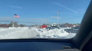 Video shows abandoned vehicles, fire truck lined along street in Buffalo during winter storm
