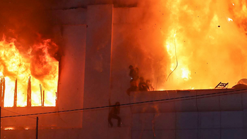 Dramatic images show people trying to flee massive fire at Cambodia hotel casino that left at least 16 dead